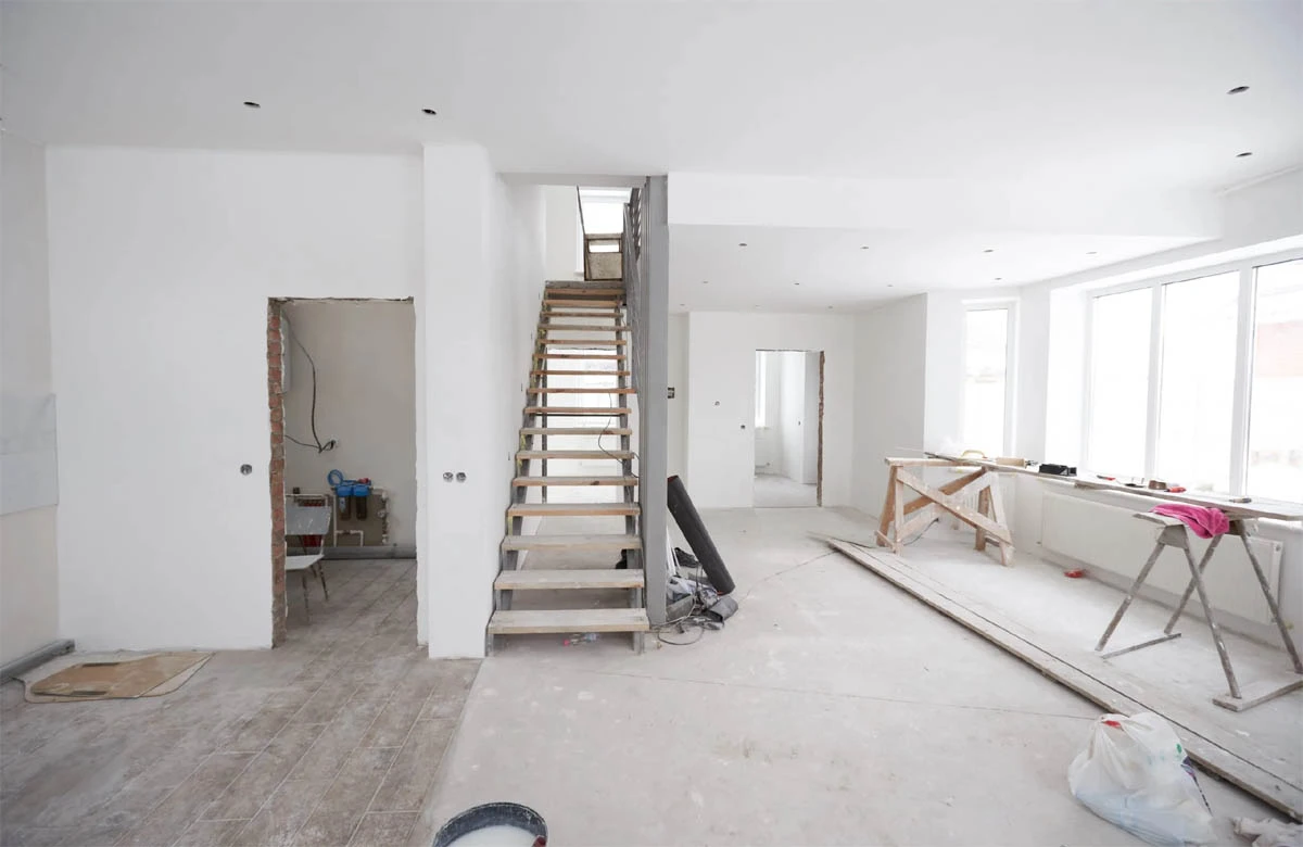 Clean structural transformation underway by trusted Austin remodeling contractors. Expert execution of stair installation and interior wall upgrades.