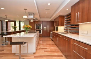 Plan your kitchen remodel in Austin Texas: full checklist includes traditional upgrades like this timeless granite island and white cabinetry.